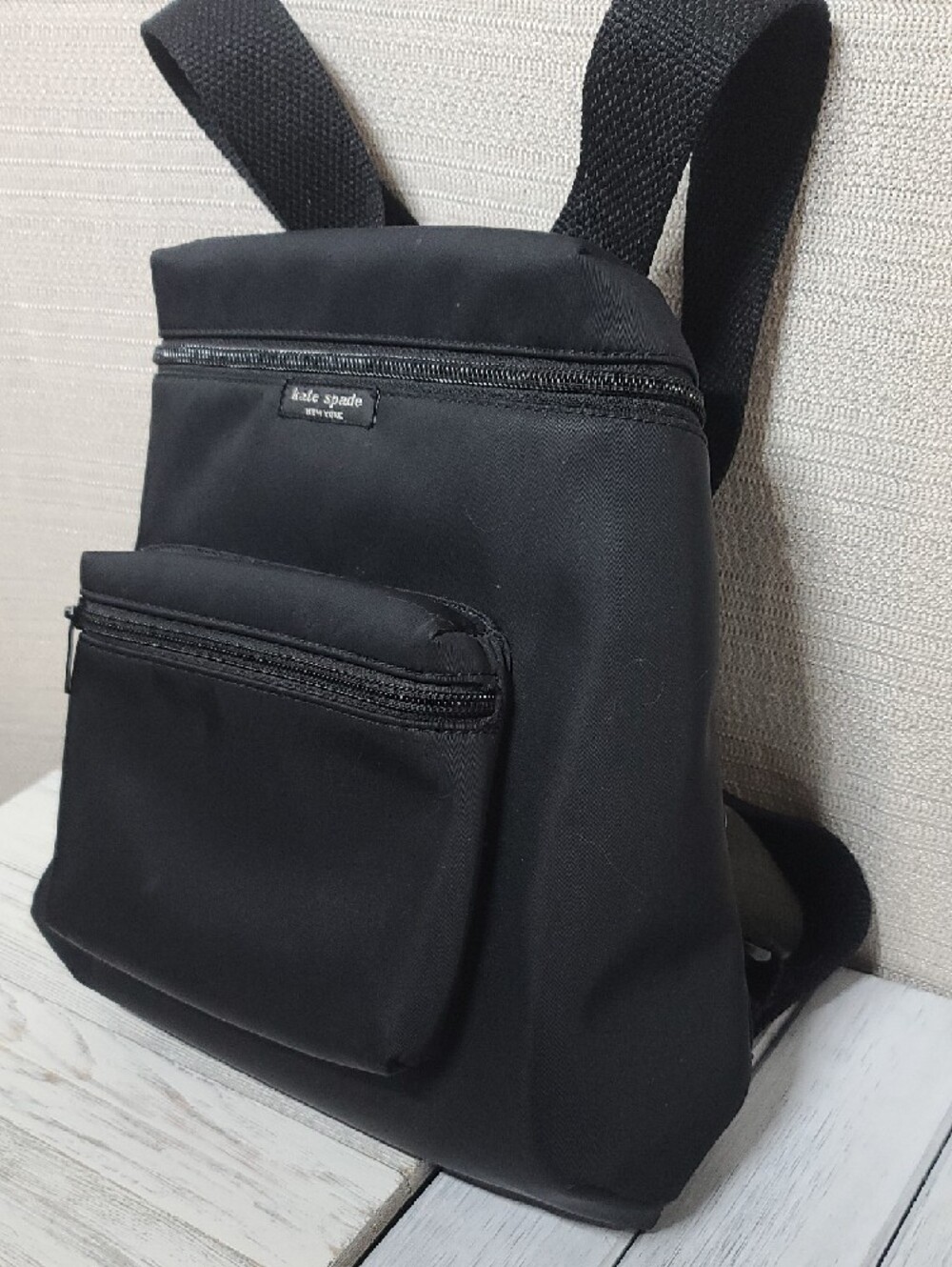 Kate Spade black nylon commuter backpack with a front zip pocket, Woven Straps